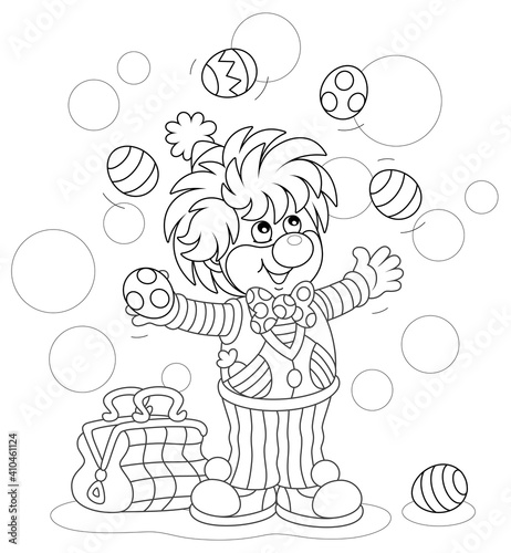 Funny and friendly smiling clown in a comic suit juggling with decorated Easter eggs and conjuring tricks in a circus performance, black and white vector cartoon illustration for a coloring book