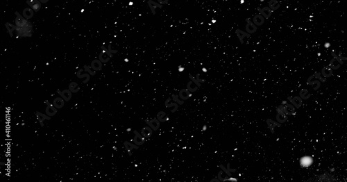 The texture of falling snow or raindrops on a black isolate background