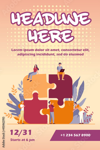 Business team putting together jigsaw puzzle