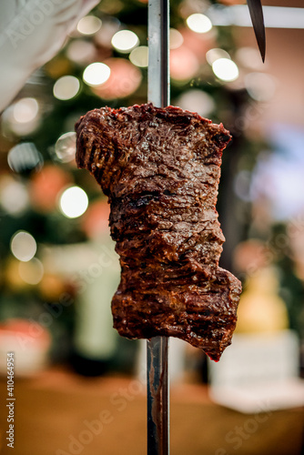 juicy beef from skewer at Brazilian steakhouse