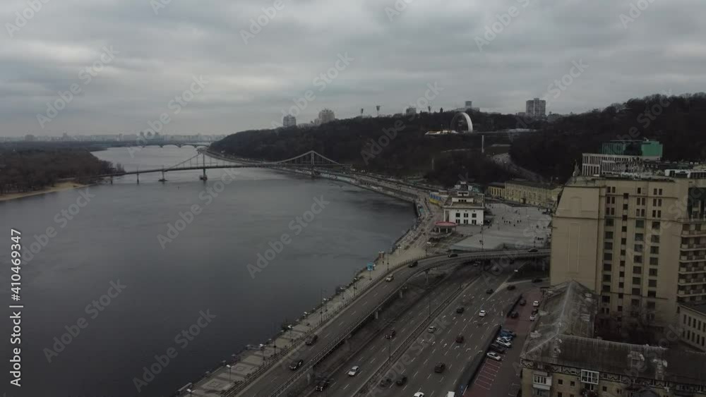 Crossing bridge over the dnieper in cloudy weather Crossing bridge over the dnieper in cloudy weather