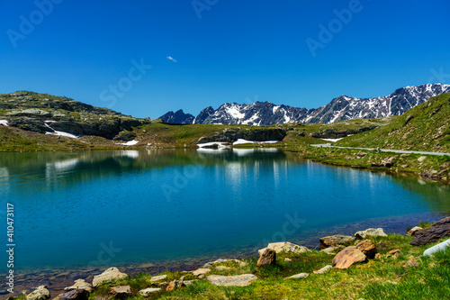 Fototapeta Naklejka Na Ścianę i Meble -  Passo Gavia, mountain pass in Lombardy, Italy, at summer. Lake