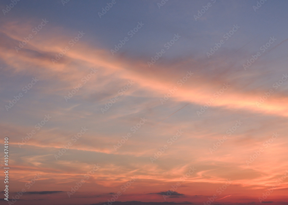 Beautiful sunset, pink clouds and blue sky