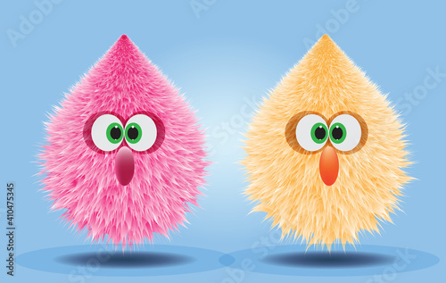 Fluffy and furry pompons in pink and orange yellow color