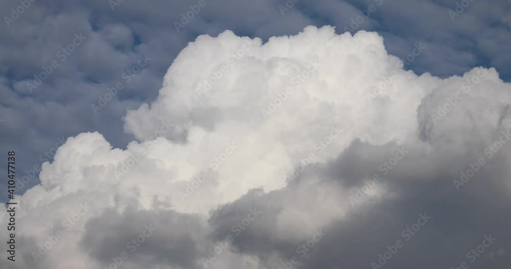 Storm Clouds Blowing Against Blue Sky