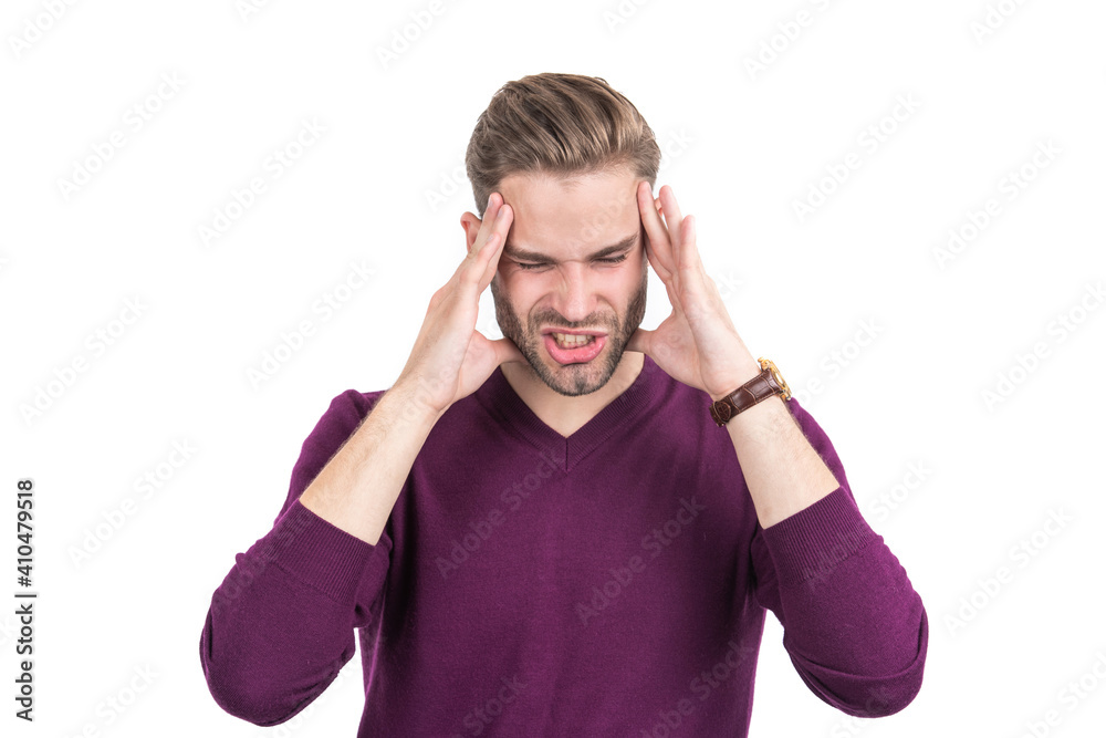 Fototapeta premium Distressed guy with closed eyes squeeze head with hands suffering from headache, migraine