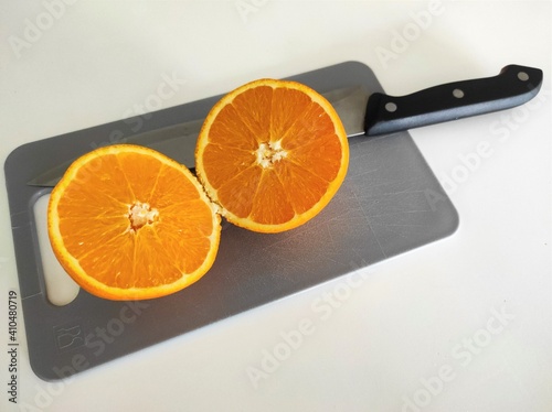 Orange sliced in half.

Zagreb, Croatia - February 2nd 2021