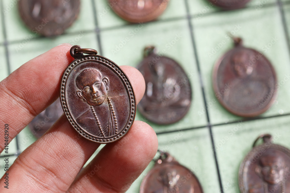 Phra Khuva Boonchum coins , Small Buddha image or Thai amulet