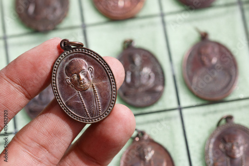 Phra Khuva Boonchum coins , Small Buddha image or Thai amulet