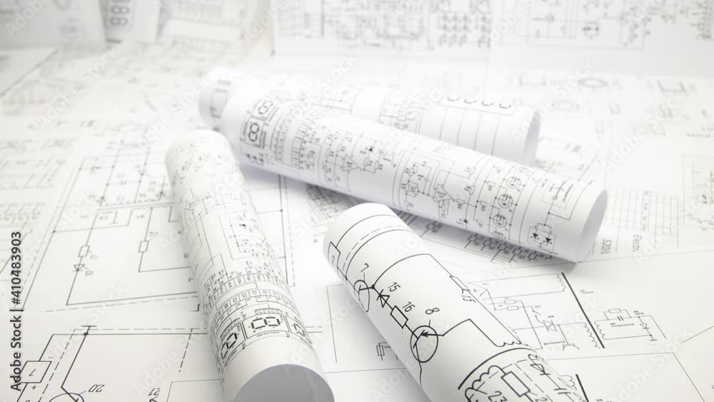 Paper electrical engineering drawings. Work of an electronic engineer.