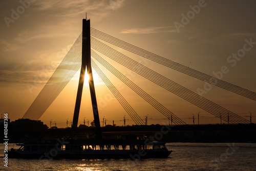 cable stayed bridge silhouette at sunset