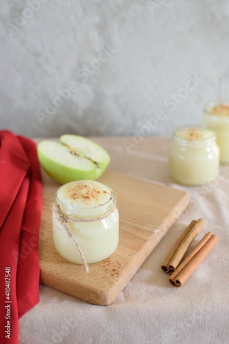 cream apple 
with cinnamon on a light background