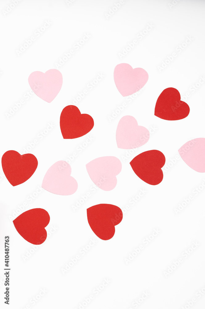 Top view of colorful paper hearts isolated on white. Valentine's Day postcard. Valentine's Day Background.