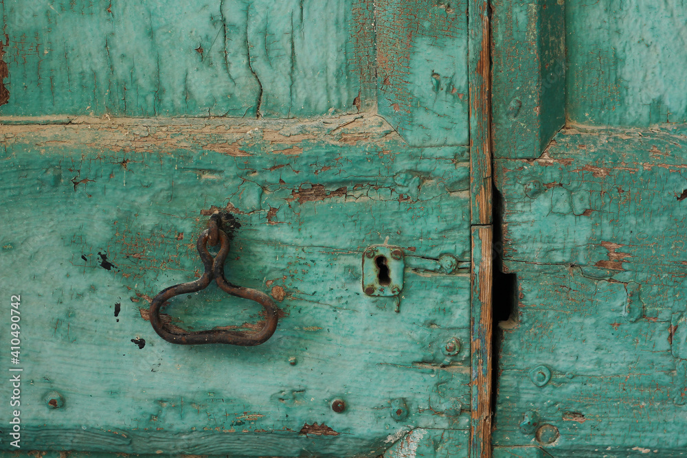 Closed Old vintage blue turquoise wood Door