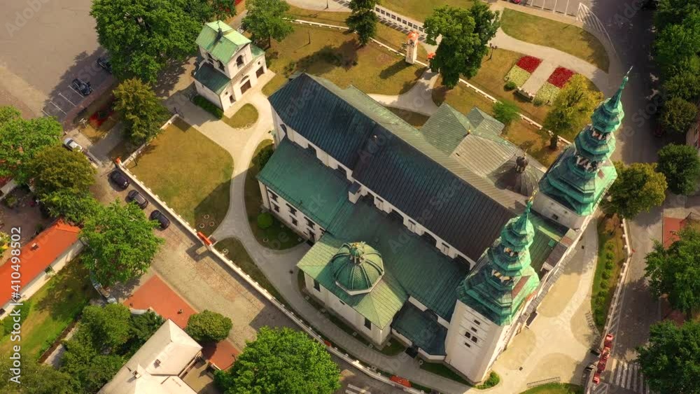 Top aerial panoramic view of Lowicz old town historical city centre with Rynek Market Square, Old Town Hall, New City Hall, colorful buildings with multicolored facade and tiled roofs, Poland Top aerial panoramic view of Lowicz old town historical city centre with Rynek Market Square, Old Town Hall, New City Hall, colorful buildings with multicolored facade and tiled roofs, Poland