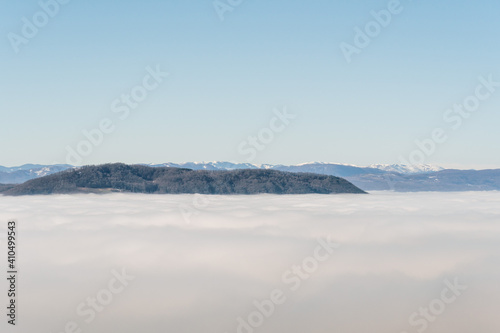 Dense fog over rural fields in West Serbia