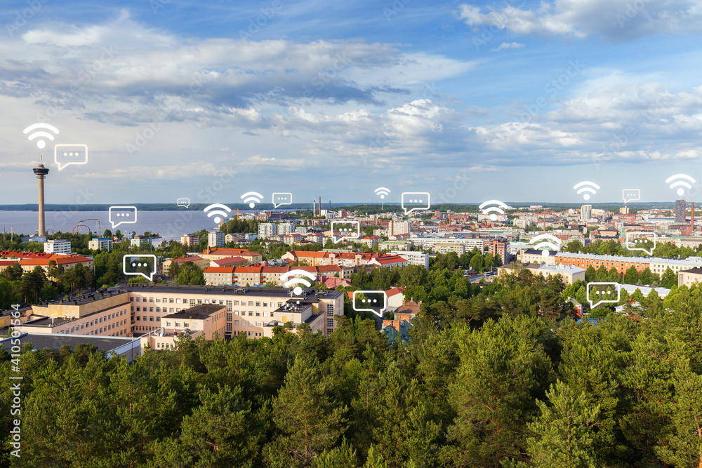 Näsinneula observation tower and the city of Tampere, Finland, viewed from above on a sunny day in the summer. Wireless network connection, WiFi, smart city and online messaging concept. 