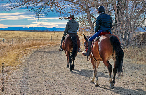 Horseback riders on a trail in Colorado © Jim Glab