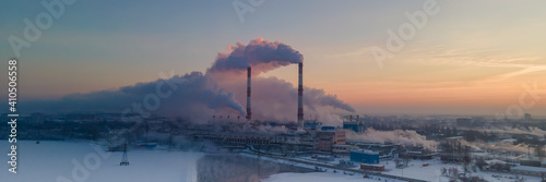 Industrial zone with pipe thick white smoke is poured from the factory chimney. Pollution of the environment  a pipe with smoke. Wide banner