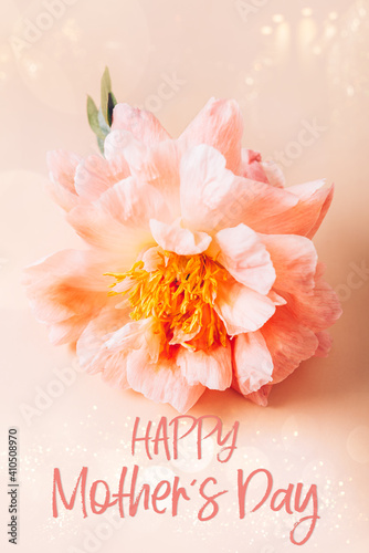 Happy Mothers Day card with text. Amazingly beautiful pink Peony on light pink background. Card Concept