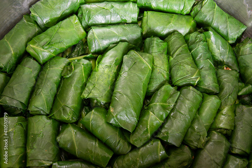 Wrap collard with rice with meat, stuffed collard in a pot is traditional Turkish cuisine.