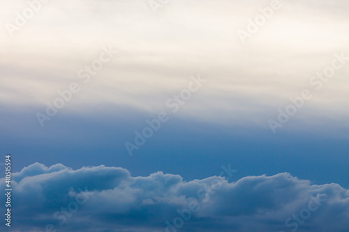 Blue sky and clouds at sunset. Background sky. Nature