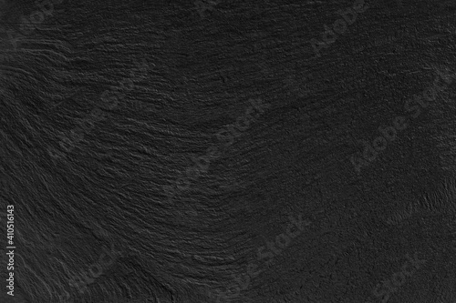 Dark grey black slate background or texture.