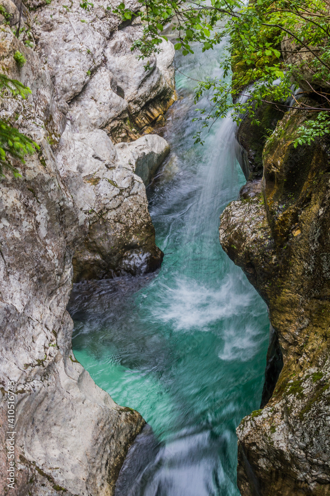 Small waterfall in Soca river gorge near Bovec village, Slovenia