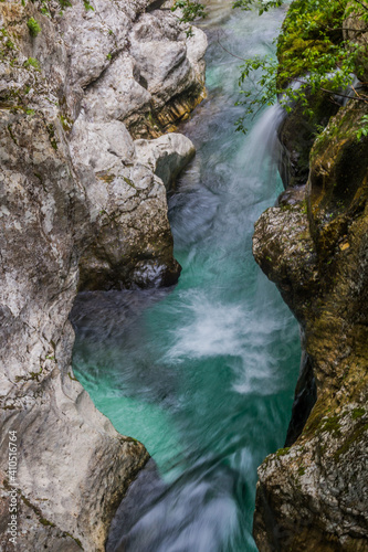 Small waterfall in Soca river gorge near Bovec village, Slovenia