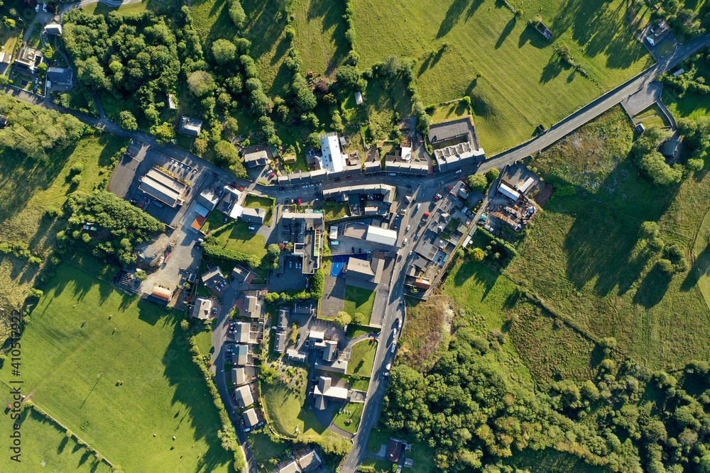 The village of Clonbur is snugly situated between Lough Corrib and