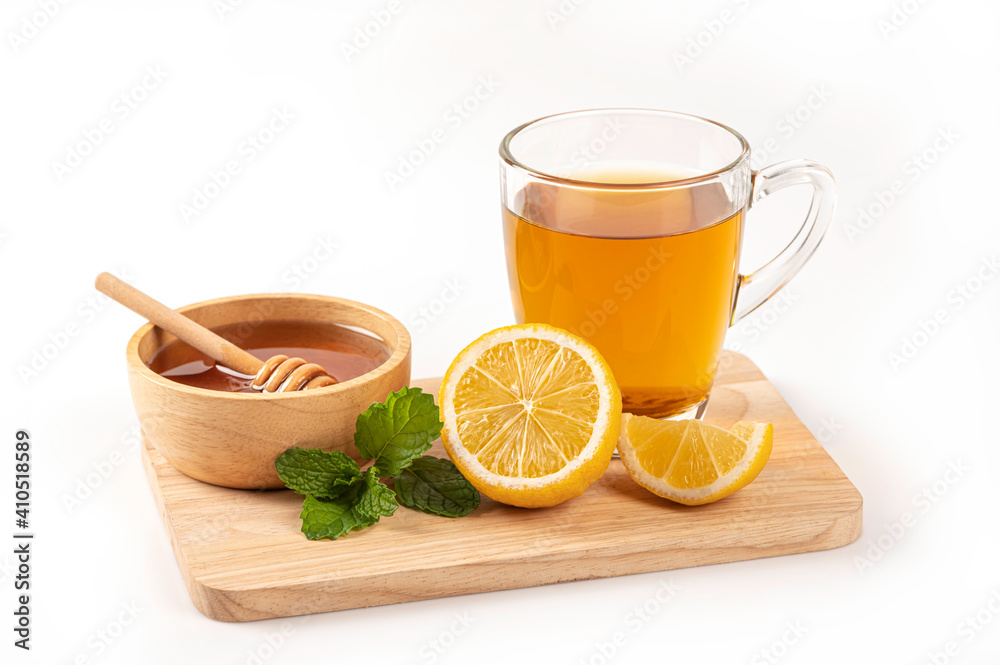 Cup of tea with lemon, honey and mint on white background. Cup of tea with lemon, honey and mint on white background.