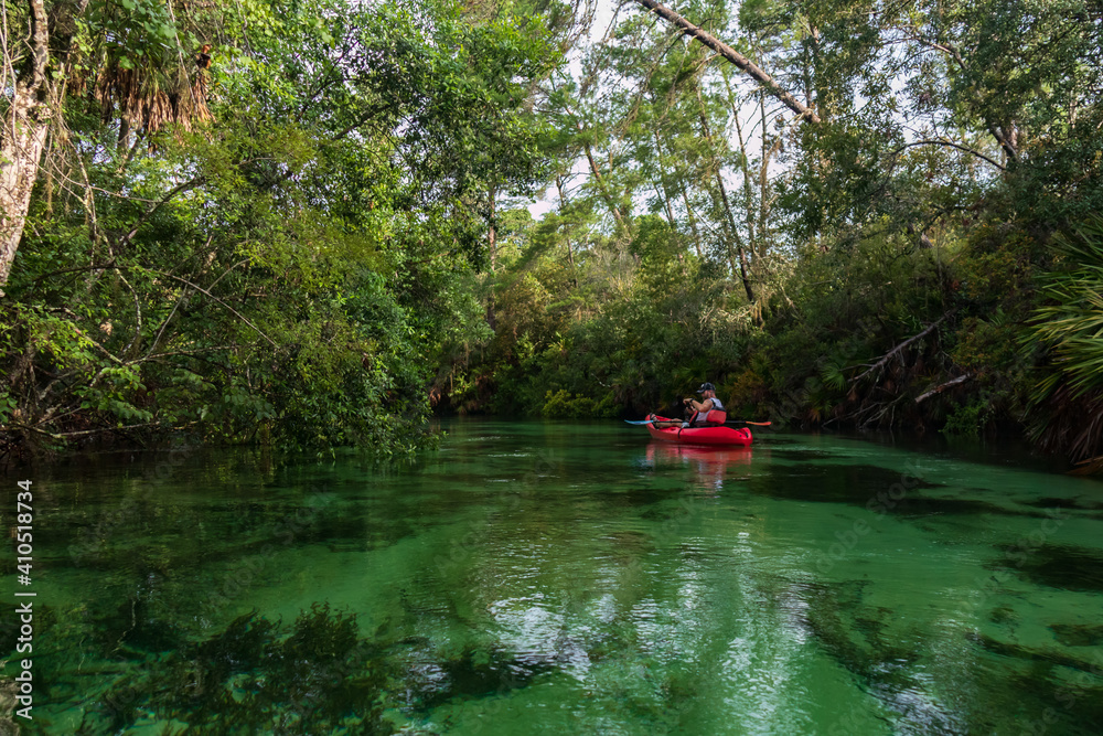 Kayaker on the Weeki Wachee River Kayaker on the Weeki Wachee River