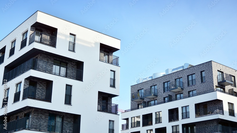 Modern apartment building in sunny day. Exterior, residential house facade.