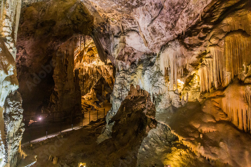POSTOJNA, SLOVENIA - MAY 17, 2019: Rock formations of Postojna cave, Slovenia