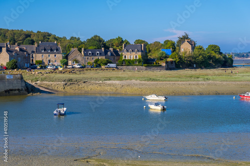 Saint-Cast Le Guildo, France - August 25, 2019: The Harbor of Guildo at low tide in the coastal river L'Arguenon, Brittany, France photo