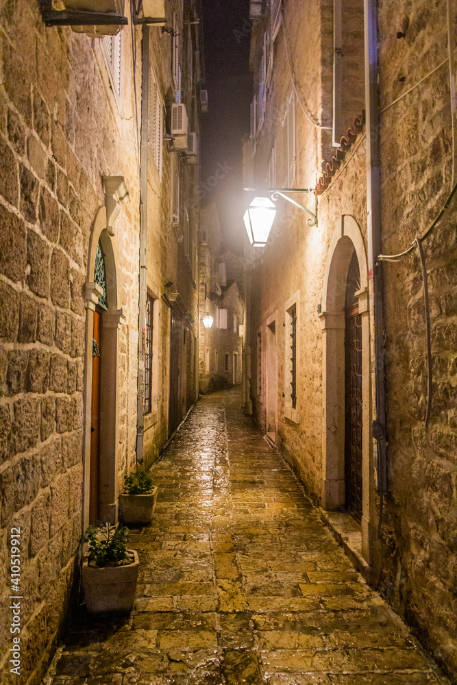 Evening view of an alley in the old town in Budva, Montenegro