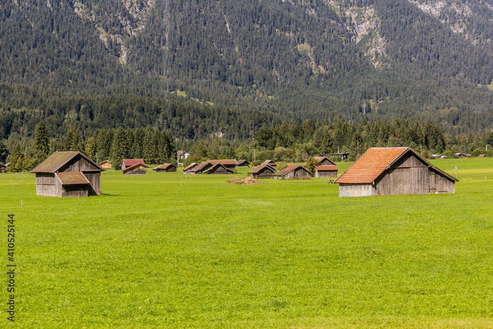 Barns and meadows in Loisach valley, Germany