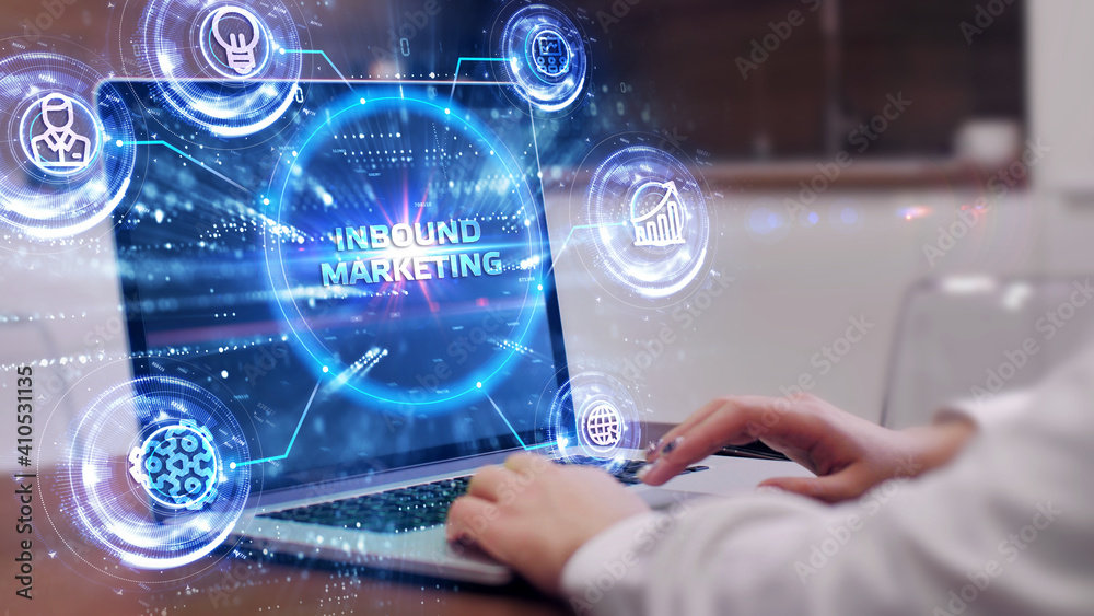 The concept of business, technology, the Internet and the network. A young entrepreneur working on a virtual screen of the future and sees the inscription: Inbound marketing The concept of business, technology, the Internet and the network. A young entrepreneur working on a virtual screen of the future and sees the inscription: Inbound marketing