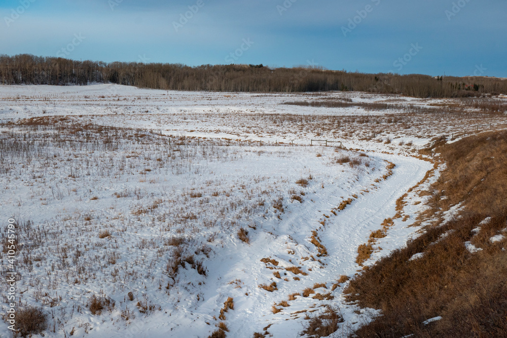 prairie landscape with snow and sky