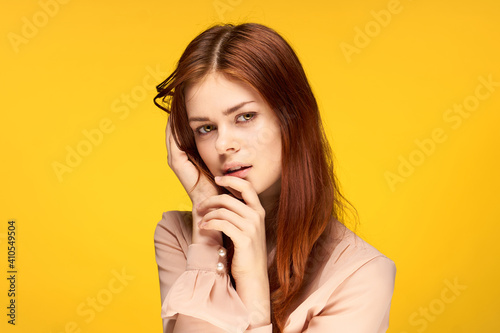 attractive woman emotion home cropped view glamor yellow background