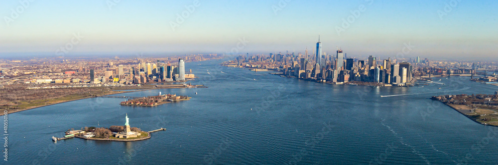 Panoramic view of New York City in United States of America during a blue sky day, with clear skies and dense, populated cities view. 