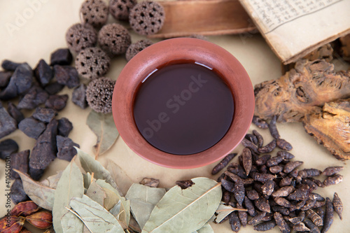 Obraz na plátně A pile of Chinese herbal medicine and a bowl of Decoction