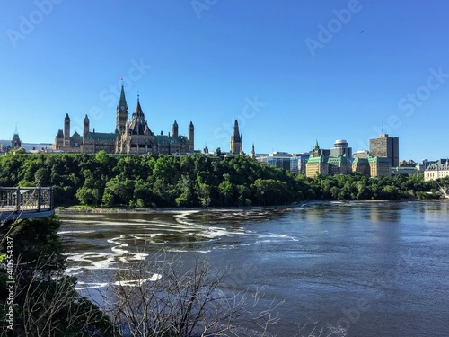 A view from the Alexandra Bridge on a beautiful sunny summer day of Parliament hill, the Supreme Court of Canada and the Ottawa River in Ottawa, Ontario, Canada