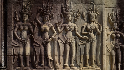 buddha statue in temple. Apsara sculpture at angkor wat temple  