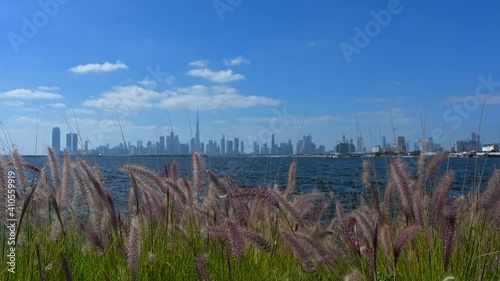 4K Footage: Dubai skyline from the creek harbour on a beautiful bright sunny day in the United Arab Emirates photo
