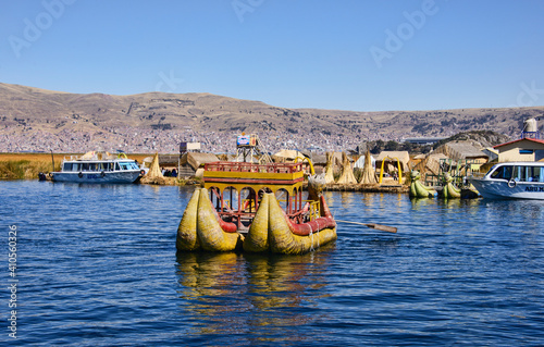 Traditional reed boat of the Uros islands, Lake Titicaca, Puno, Peru photo