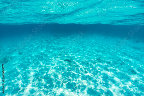 Underwater of tropical  sun rays passing through water. © satit