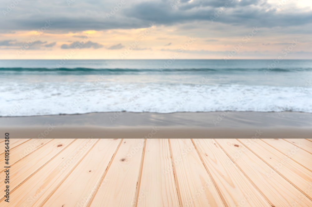 Wooden floor or plank on beach For product display.Calm Sea and Blue Sky Background.tropical in summer.