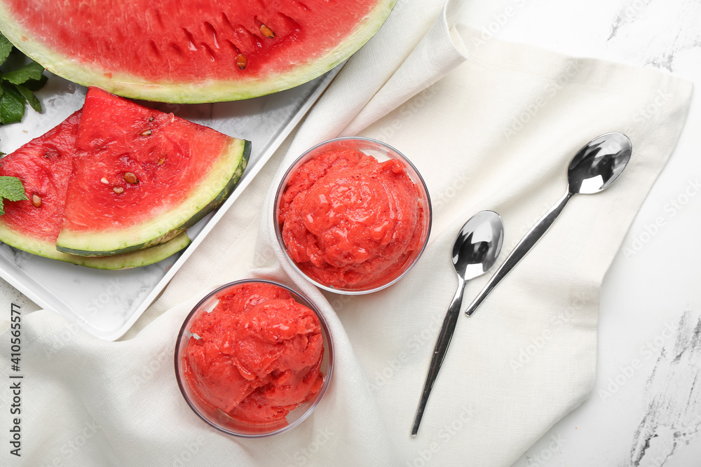 Glasses with watermelon ice cream on fabric background Glasses with watermelon ice cream on fabric background