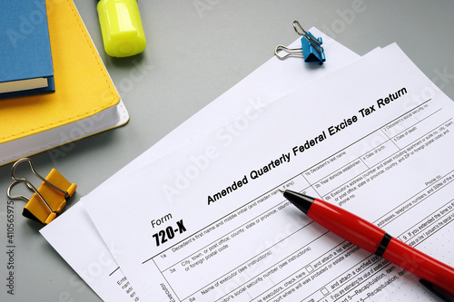 Business concept about Form 720-X Amended Quarterly Federal Excise Tax Return with phrase on the page.